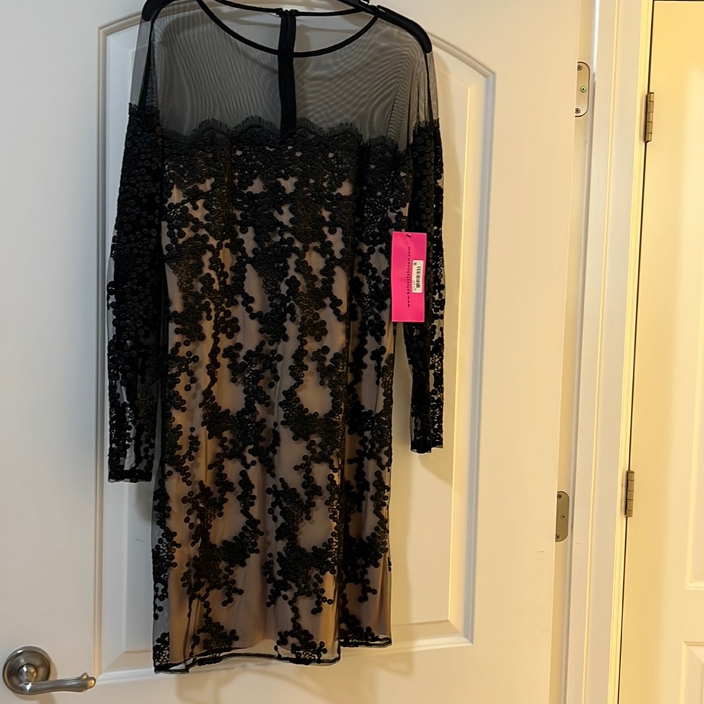 Black lace with cream underlining.
